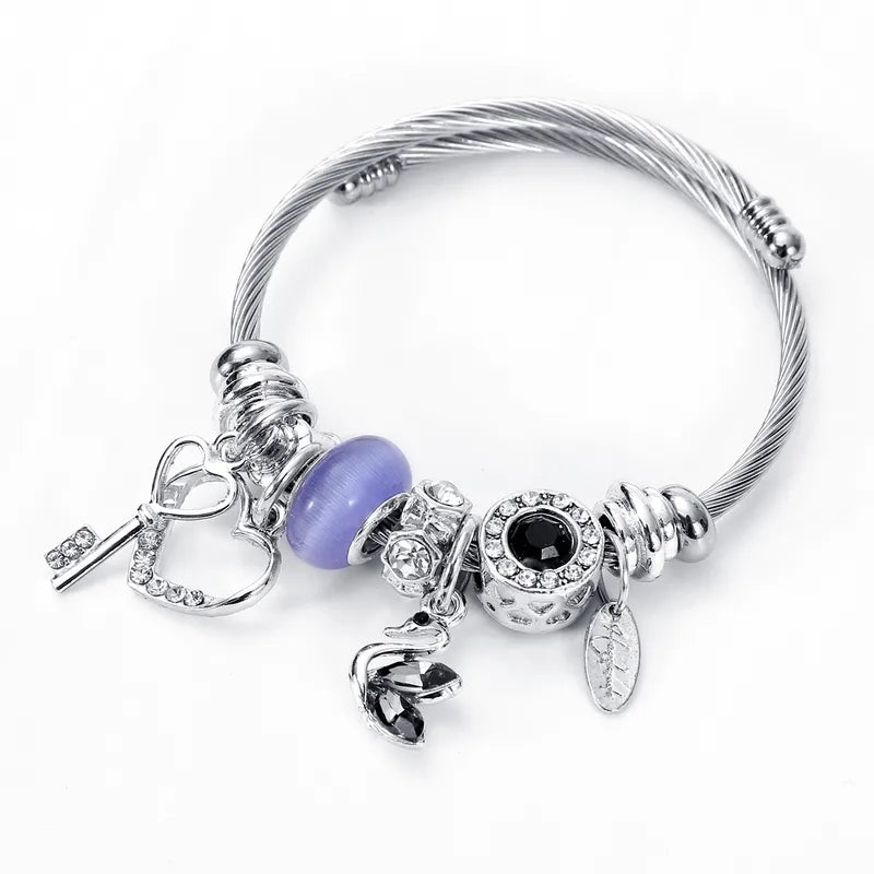 Βραχιόλι ατσάλι με κύκνο και charms-BR231