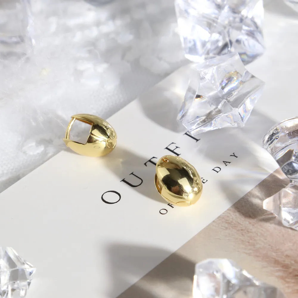 Σκουλαρίκιa ορειχάλκινα Χρύσα οβάλ - w131
