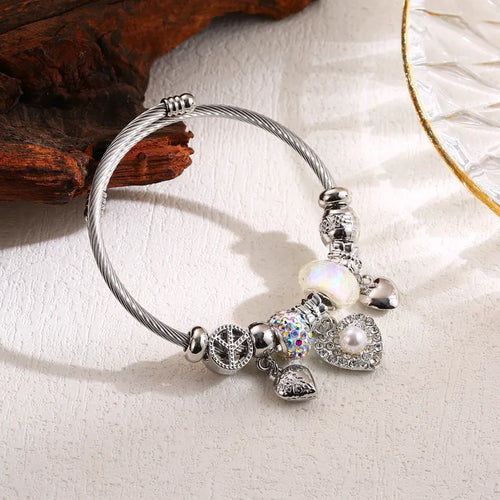 Βραχιόλι ατσάλινο με καρδιές και charms -BR303