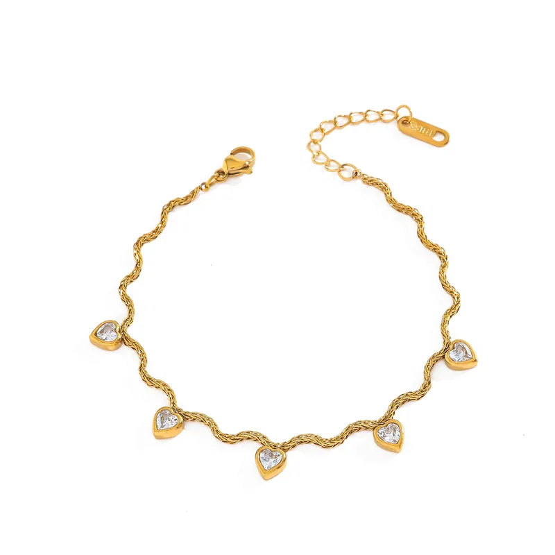 Βραχιόλι επιχρυσωμένο ατσάλι με καρδιές zircon-BR056