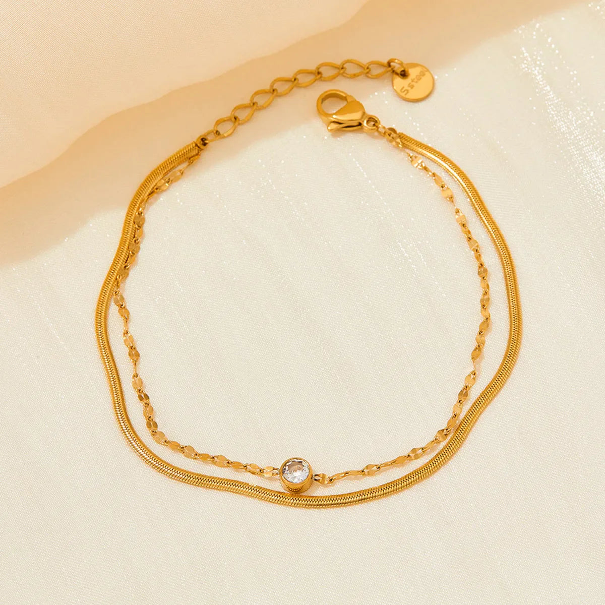 Βραχιόλι ποδιού χρυσό ατσάλι διπλό με zircon-AN043
