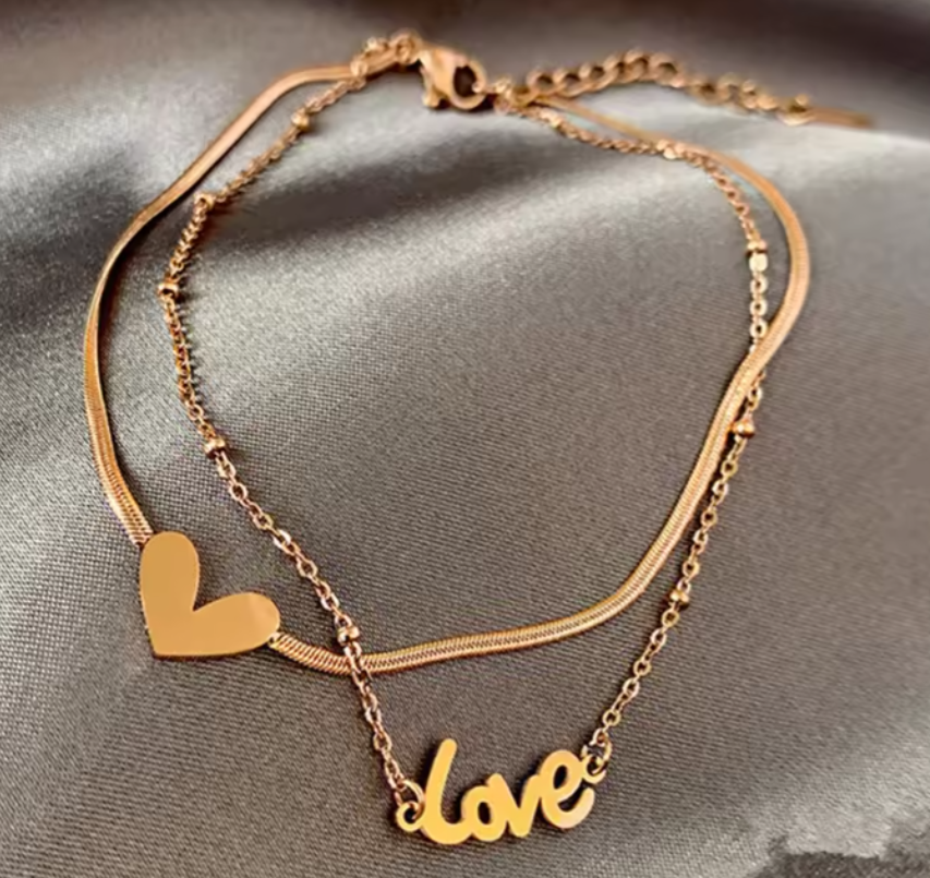 Βραχιόλι ποδιού χρυσό ατσάλι με επιγραφή love-AN047